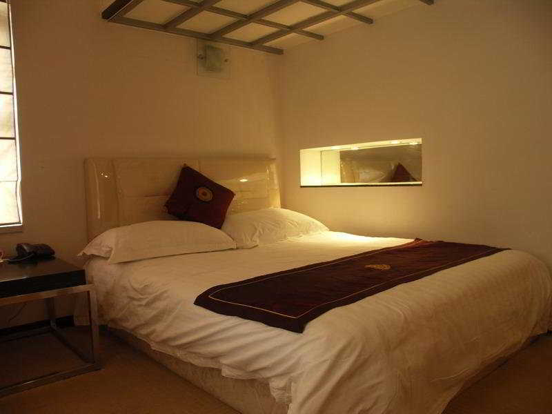 Tong Ji Garden Apartment Шанхай Стая снимка